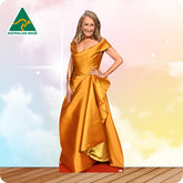 Woman in a gold evening gown with 'Australian Made' logo in the corner